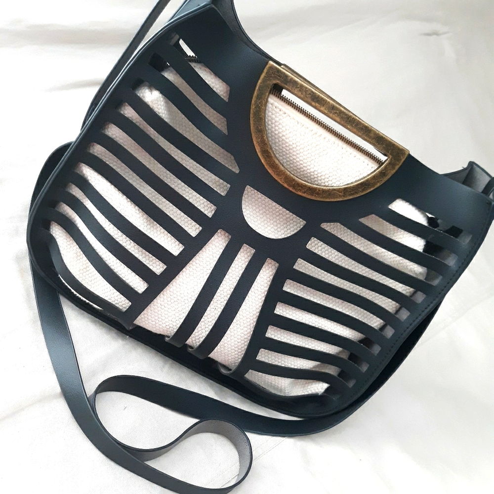{ HANDBAG }